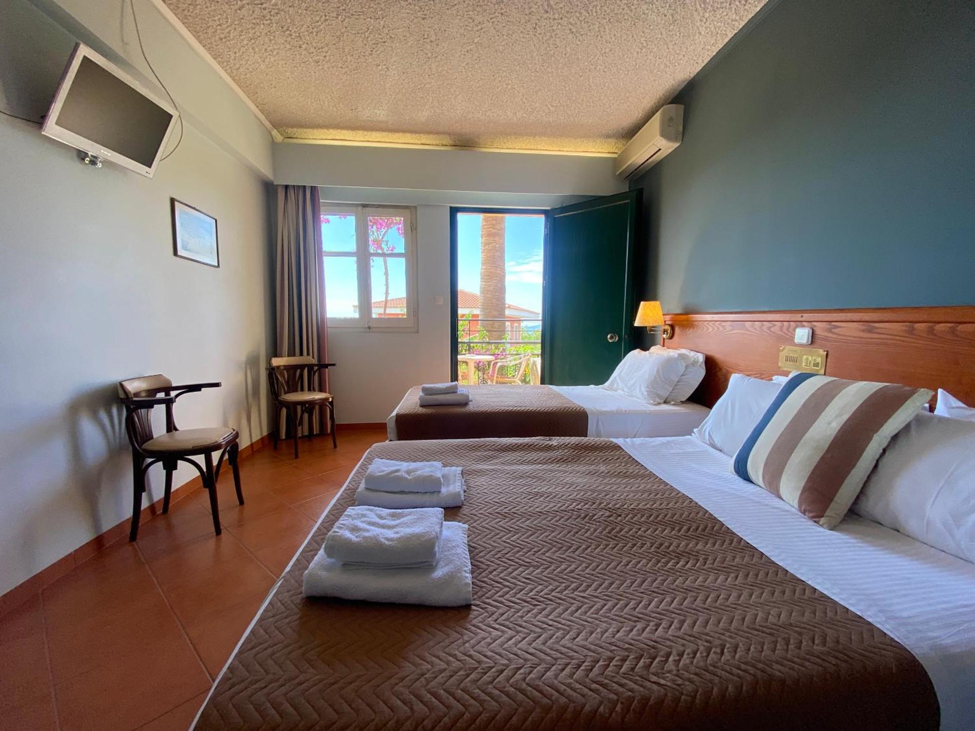 Sunrise Inn Pesádha Habitación foto